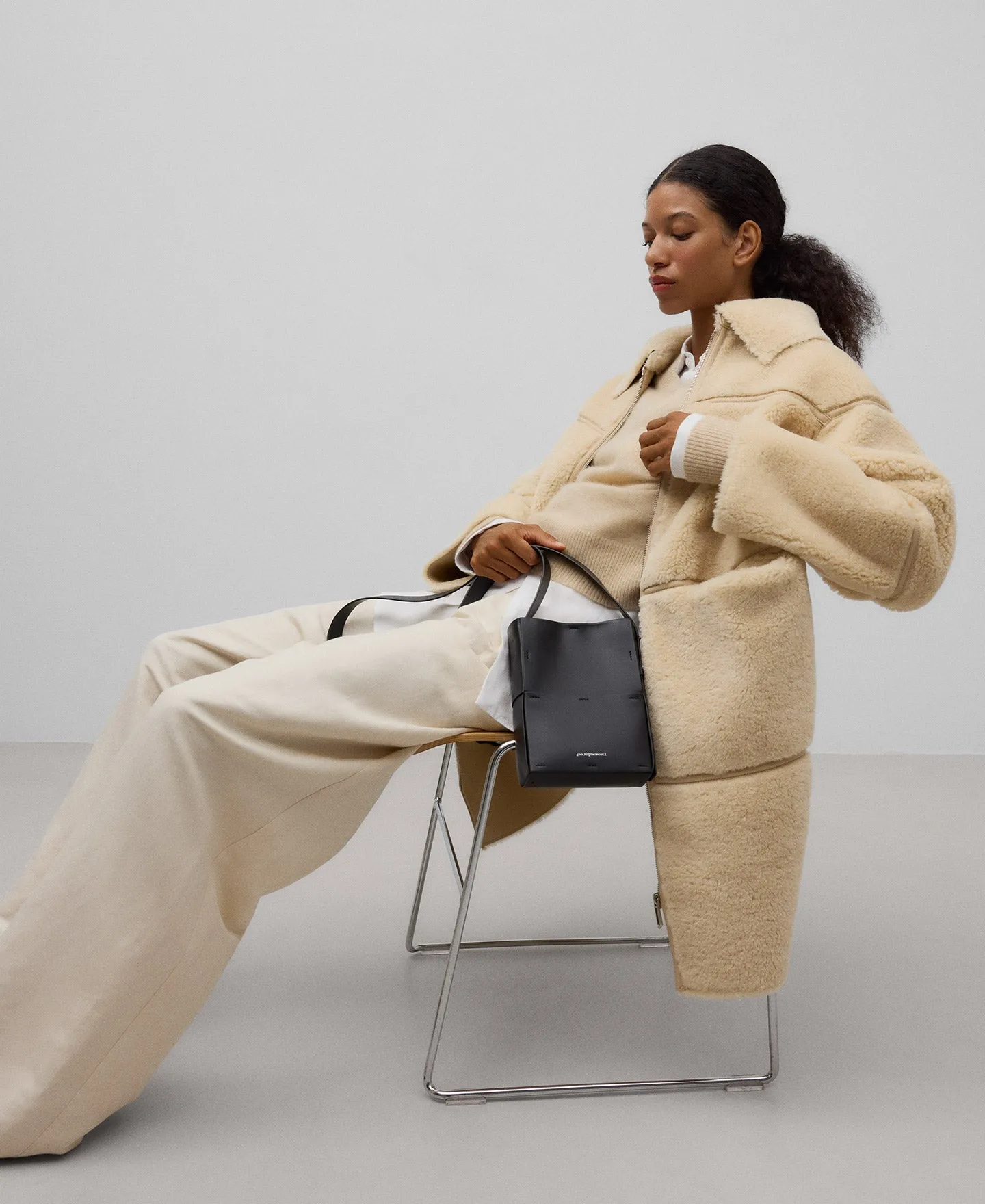 Long shearling coat woman in light cream