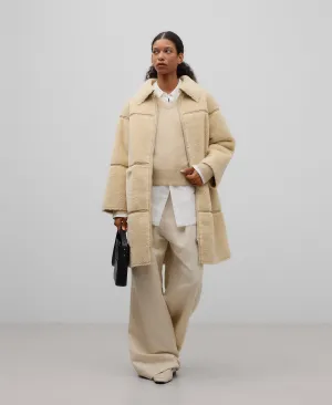 Long shearling coat woman in light cream